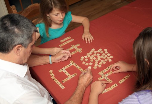 Tom playing Numenko with his grandkids.